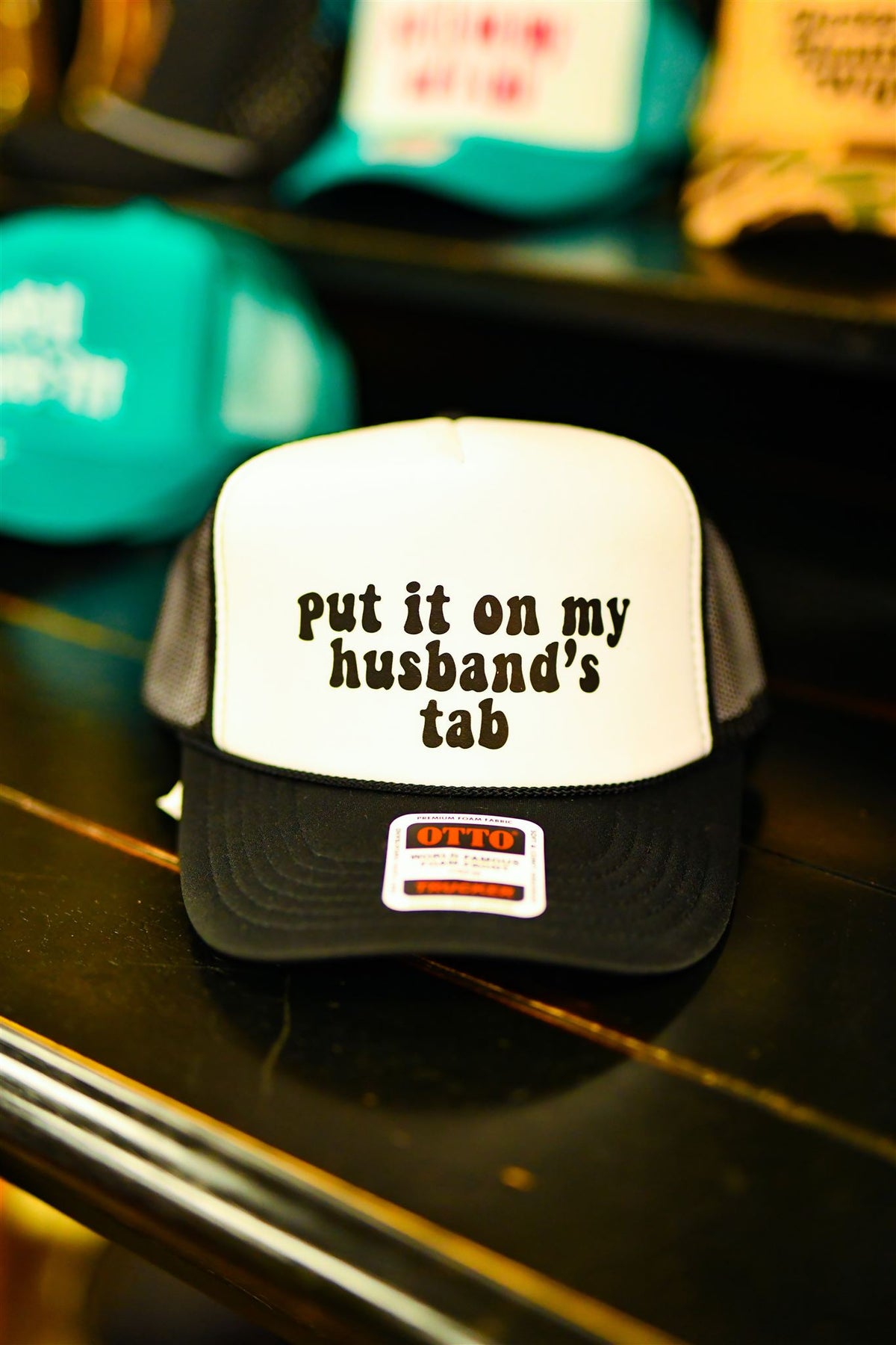 Put it on my husbands tab cap
